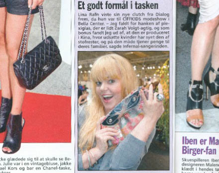 newspaper photo of singer with clutch