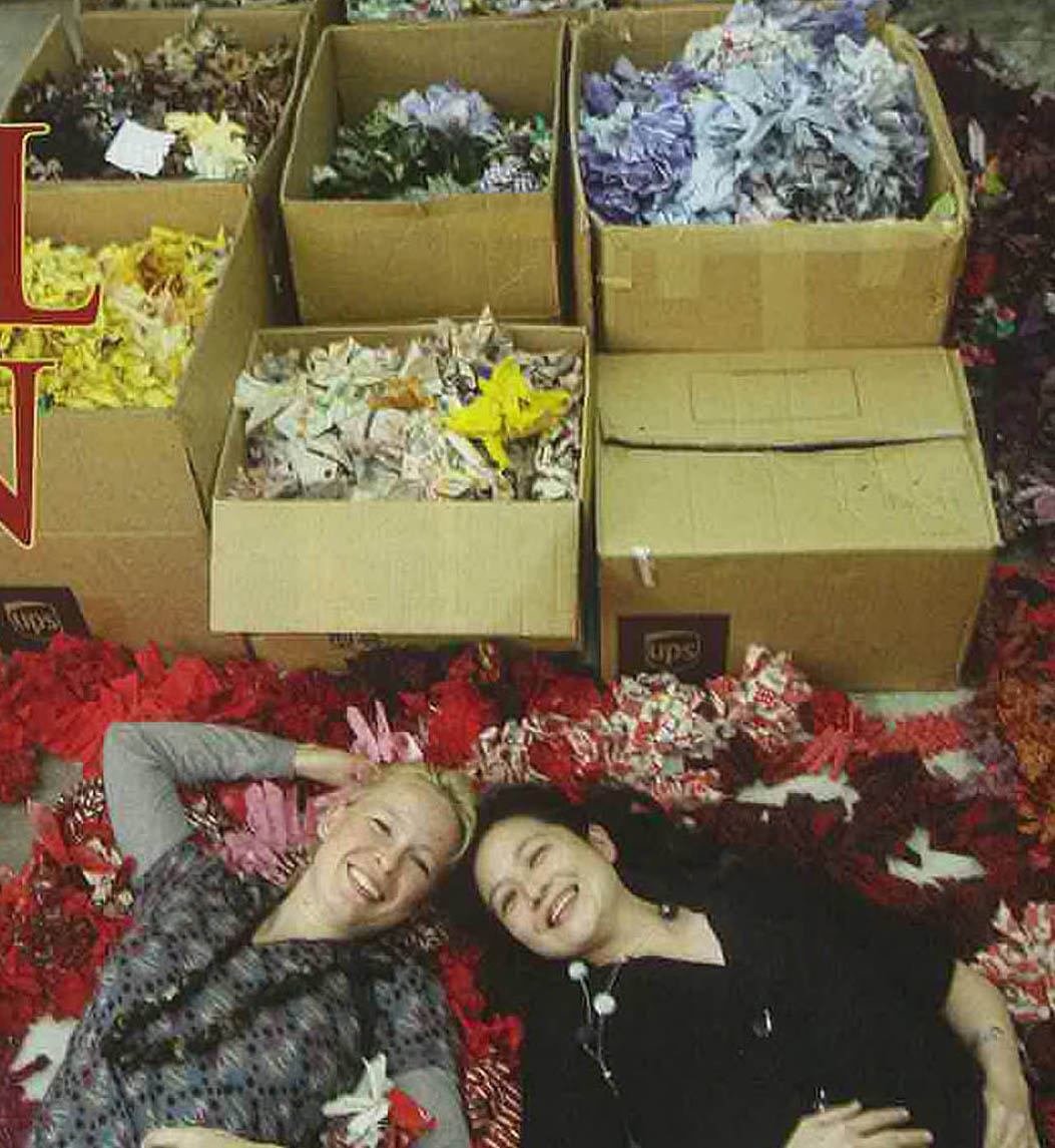 designers posing with upcycled textiles
